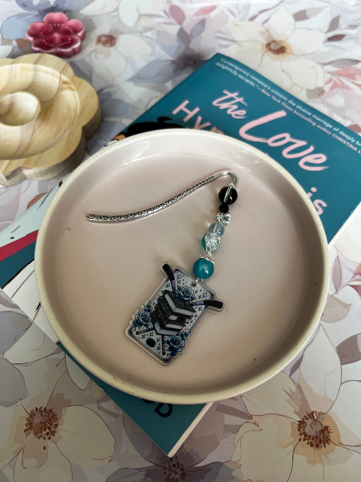 Bookmarks!! Whimsical, Fun, Evocative most importantly, never lose your reading spot!